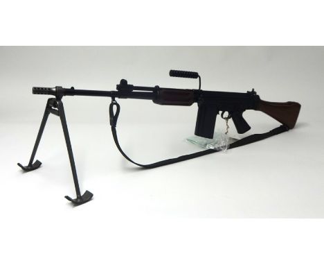 Deactivated; a Belgium FN FAL SLR. Assault rifle, number P1762, calibre 7.62mm, with tripod, magazine and sling. Sold with ce