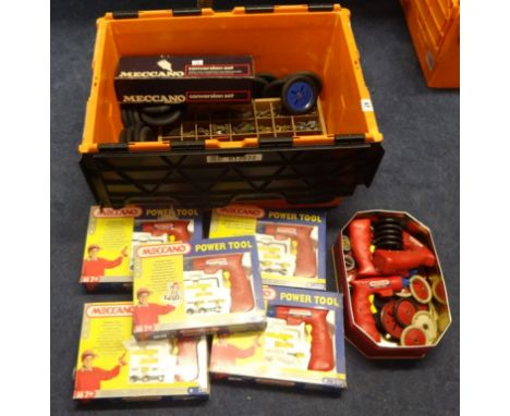 Large collection of Meccano including wheels, tyres, nuts/bolts, cogs and strips etc also 5 sets of Meccano power tools and a