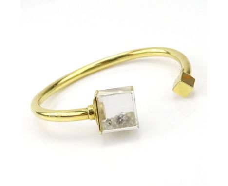Vintage 18 Karat Yellow Gold Bangle Bracelet with Small Lucite Cube End filled with Small Round Cut Diamonds. Signed dm 750. 
