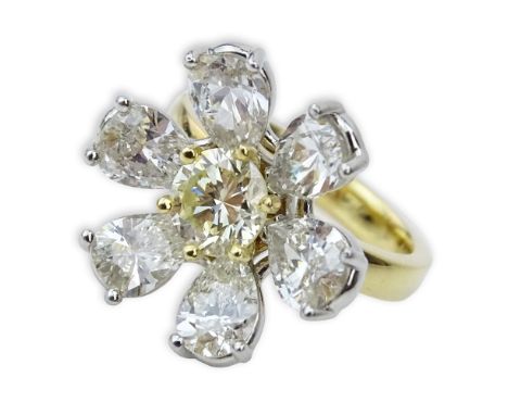 Approx. 5.25 Carat Diamond Platinum and 18 Karat Gold Flower Ring Set in the Center with a 1.25 Carat Round Brilliant Cut Dia