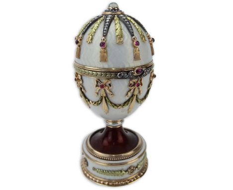 Early 20th Century Russian 56 Rose, Yellow and White Gold (14K), Moire and Guilloche Enamel Egg accented throughout with Rose