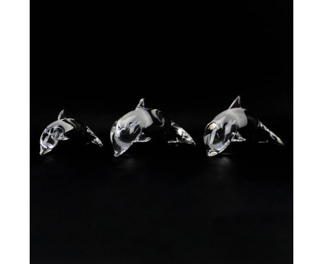 Set of Three (3) Steuben Clear Crystal Dolphin Figurines. Signed. 2 figures have repairs to fin. Largest measures 12-1/4" L. 