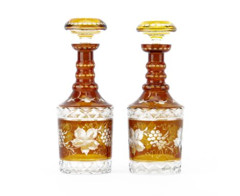 Pair of Vintage Bohemian Amber to Clear Decanters. Small nick to base on one decanter. Measures 11-1/2" H. Shipping $85.00 (e