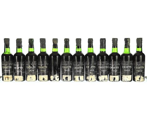 1960 Croft, Vintage Port 12x37.5cl  2 HS, 1 label missing, embossed wax capsules, several damaged.    This lot forms part of 