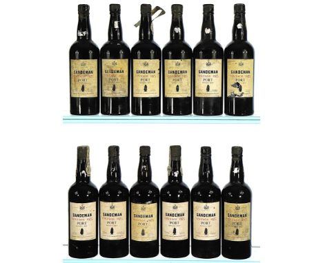 1975 Sandeman, Vintage Port  12x75cl  Labels soiled, 1 damaged, embossed capsules damaged, several partly missing on top.    