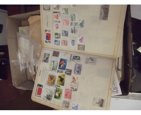 Stamp album containing World stamps, together with loose stamps and related ephemera