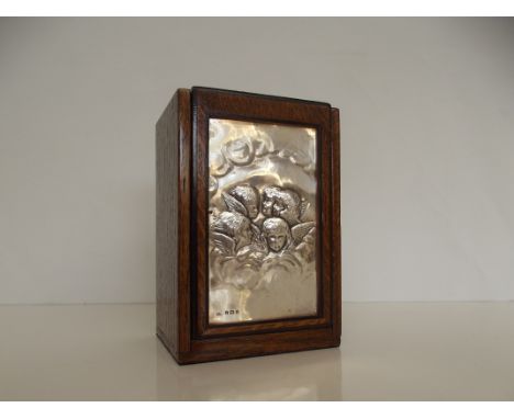 Wooden perfume bottle holder with sterling silver front depicting angels with ceramic perfume bottle inside 15cm