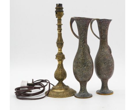 A pair of patinated brass vases with wrapped handles along with a brass foliate design table lamp.  H.34cm 
