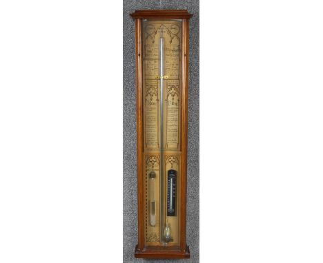 A late 19th century Admiral Fitzroys barometer with Gothic revival lithograph printed back papers, mercury tube, storm tube a