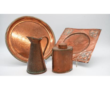 A collection of Arts and Crafts copper items. Including an engraved copper tea caddy with central motif by JS&amp;S, a square