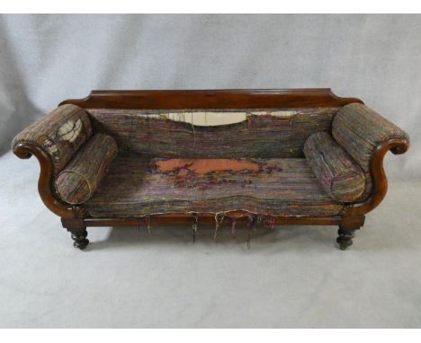 A Victorian mahogany framed double scroll end sofa with long squab cushion and end bolsters on turned tapering supports. H.85