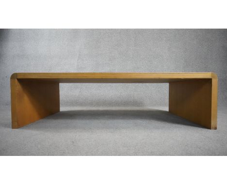 A contemporary light oak low table. H.38 W.130 D.62 