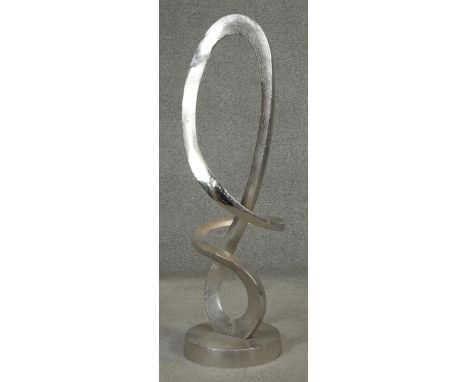 A silver plated abstract sculpture. Unsigned. H.96cm 