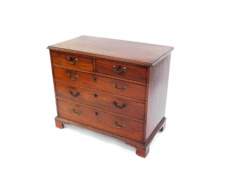 A George III mahogany chest, of two short over three long graduated drawers, raised on bracket feet, 81cm high, 95cm wide, 50