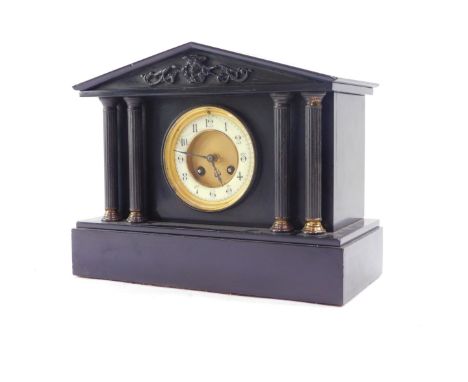 A Victorian slate mantel clock, circular brass dial with enamel brass chapter ring bearing Arabic numerals, eight day movemen