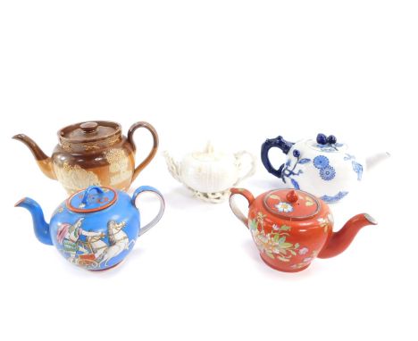 A group of teapots, comprising a Belleek Echinus teapot, Royal Worcester blue and white teapot decorated in the Japanese tast