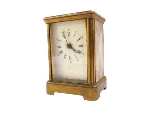An early 20thC brass cased electric carriage clock, for Edward &amp; Sons, Paris., rectangular enamel dial bearing Roman and 