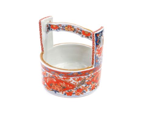 A Japanese imari porcelain water pail, painted with fan shaped reserves of butterflies and flowers against a floral ground, 1