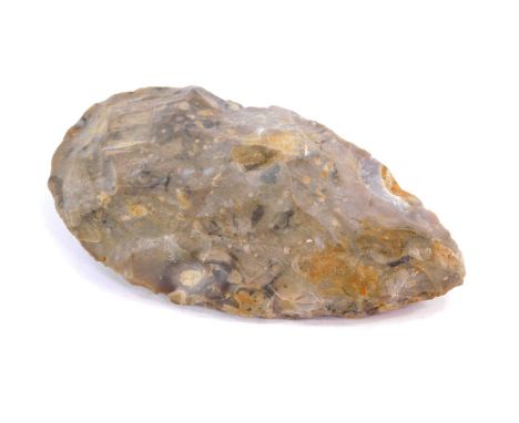 A Middle Stone Age axe head, believed to have been excavated in Norfolk, 17cm high, 9cm wide.