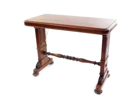 A Victorian metamorphic buffet with collapsible shelves, raised on square end supports united by a turned stretcher, on bun f