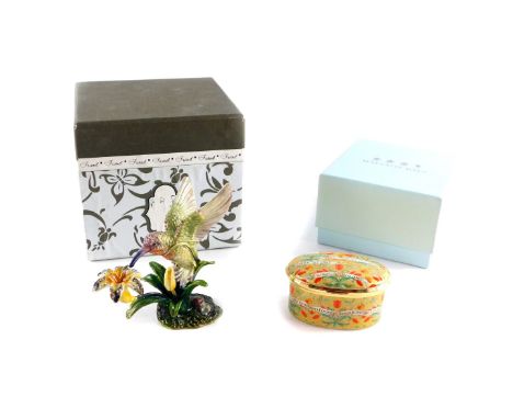 A Halcyon Days enamel musical box, playing Amazing Grace, O9-7769, boxed., together with an enamel and paste set hinged figur