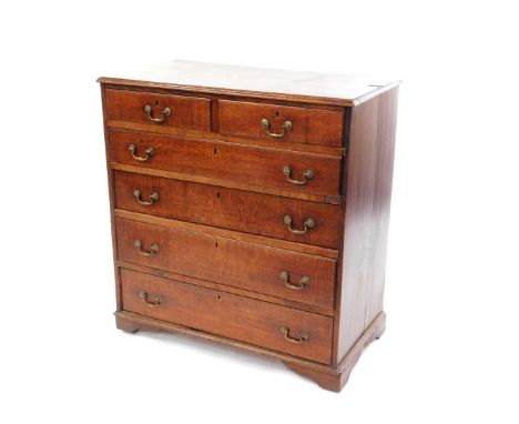 A George III oak chest, of two short over four long graduated drawers, raised on bracket feet, 105cm high, 98cm wide, 52cm de