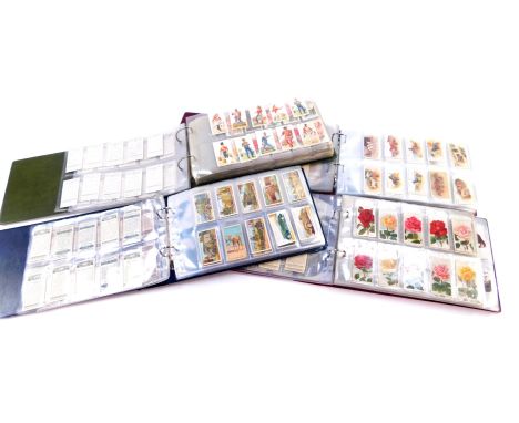 Cigarette cards, sets and part sets, including John Player's Tennis., Cavanders Foreign Birds., and Gallaher Sporting Persona