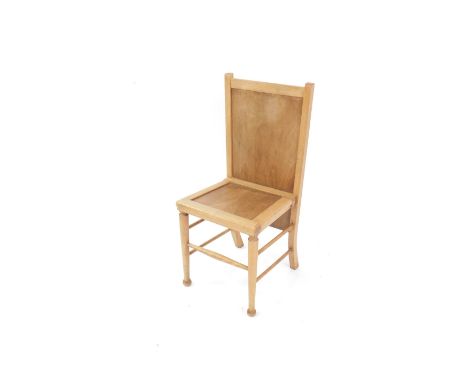 An Arts &amp; Crafts style light beech chair cum trouser press, with solid seat and back, raised on turned legs, united by sp