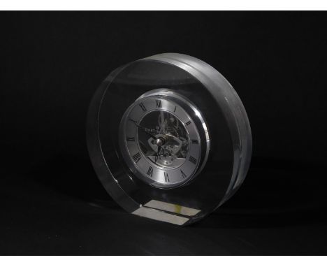 A Dartington Crystal mantel clock, with silvered chapter ring bearing Roman numerals, subsidiary seconds dial, visible escape