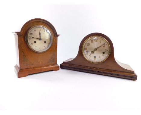 An Edwardian mahogany walnut and inlaid mantel clock, circular silvered dial bearing Arabic numerals, eight day movement with