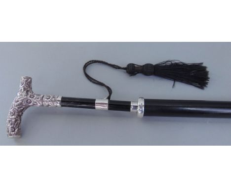 Victorian ebonised walking cane with Sunday stick type embossed silver knop upon a stepped tapered shaft