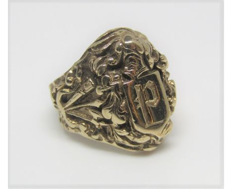 An impressive 9ct signet ring with coat of arms in relief, size Q, 17.9g