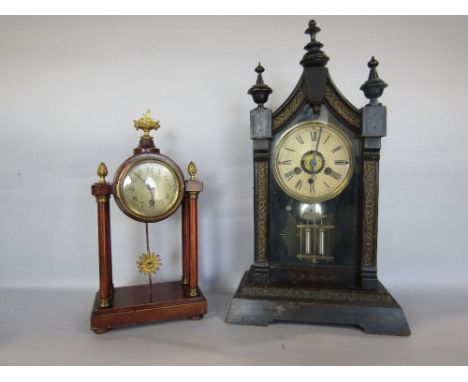 Early 20th century continental gingerbread clock, the architectural case with glass fronted door enclosing a three train dial