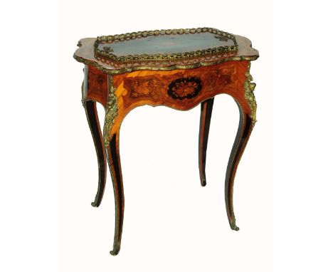 A good quality mid-19th century planter, the table with profuse floral marquetry panels, set within a shaped outline, raised 