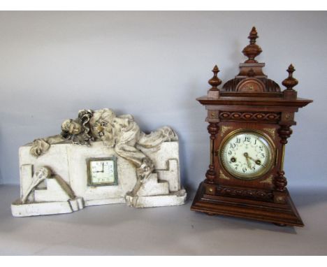 Continental architectural twin train mantel clock, with fancy enamel dial, striking on a gong, 45cm high; together with a fur