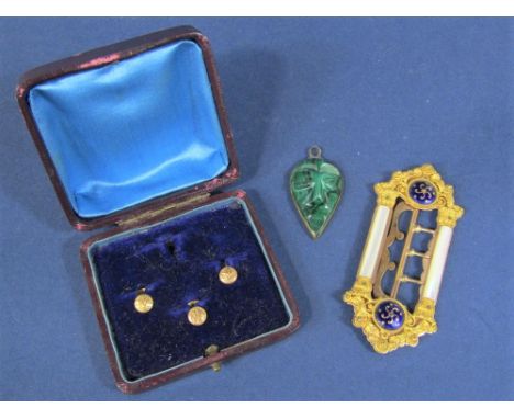 An ornate Edwardian buckle with mother of pearl and enamel decoration, together with three cased 9ct dress studs and a malach