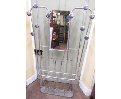 A vintage style chromium plated hall stand with mushroom shaped hooks, central mirror panel over a four divisional stick stan