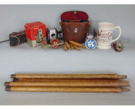 Collection of antique cricket stumps and bales, together with an over sized cup by Pilkingtons Porcelain, "The Ashes Tankard 