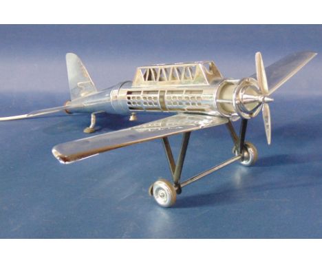 Good chrome novelty table lamp in the form of a vintage airplane, 51cm long