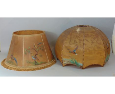 Two similar vintage velum (pig skin) light shades, one painted with ducks, the other with exotic birds (2)