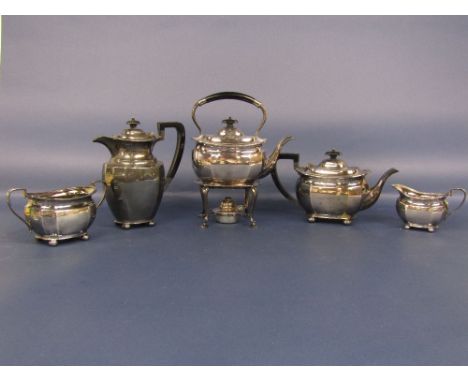 1920s silver five piece tea service of faceted baluster form comprising tea pot, water pot, milk jug, sucrier and spirit kett