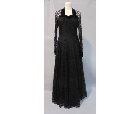 Full length vintage dress by Dickins &amp; Jones in black lace with satin underskirt, fitted bodice, full skirt and sweethear