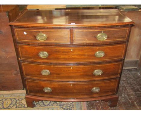 A good quality Georgian chest of three long and two short drawers, with chequered string inlaid detail and further satin wood
