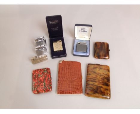 Five vintage lighters and four cigarette cases