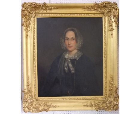 19th century British school - Half length portrait of a lady in black with lace collar and cap and gilt necklace, oil on canv