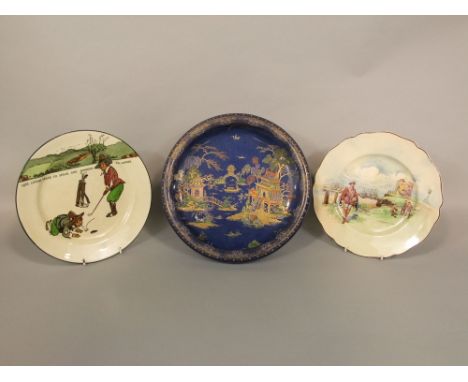 A Royal Doulton Golfing Series ware plate, a further Doulton plate showing Sir Francis Drake at Plymouth Hoe, and a blue grou