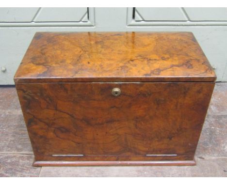 A mid Victorian walnut and figured walnut writing box by James Dewsnap of Sheffield enclosing a folding writing slop with gre