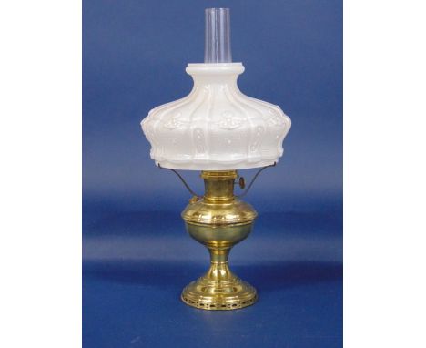 Brass Aladdin model 11 oil lamp with relief moulded opaline glass shade