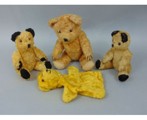 A 1950s Sooty bear, a 1950s hand puppet and a further Sooty type bear and a 20th century teddy bear (4)