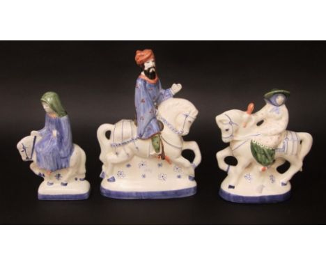 A group of three Rye pottery figures from the Canterbury Tales - The Wife of Bath, The Nun Prioress and The Knight